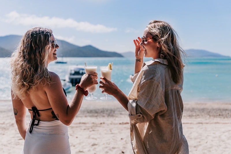 Girls on long Island Resort drinkign cocktails