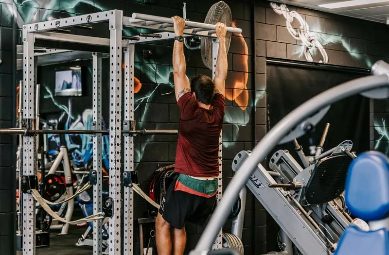 person doing pullups
