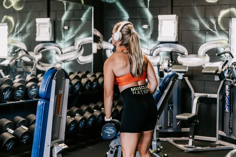 girl lifting weights