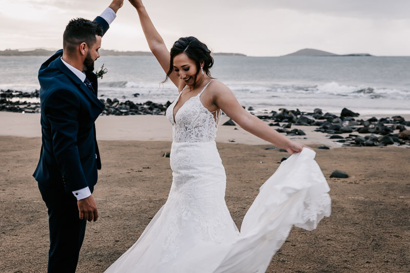 bride and groom on dancing beach