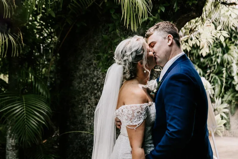 bride and groom kissing