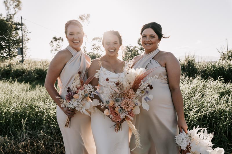 bride and bridemaids in light