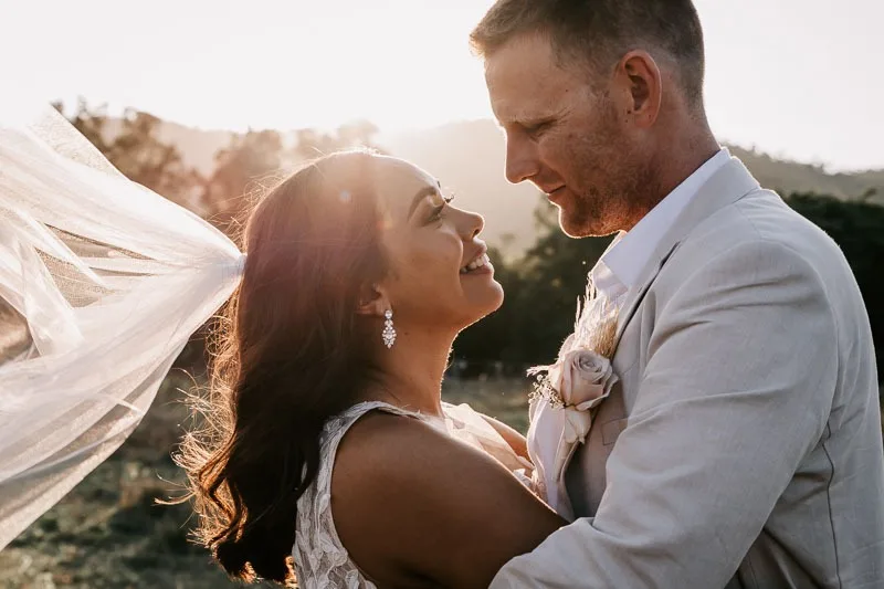 bride and groom sunset