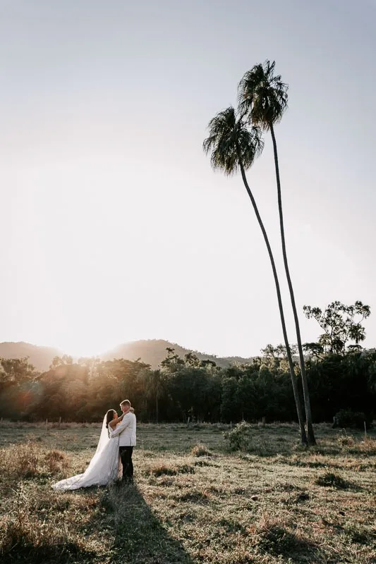 bide and groom with palm tress