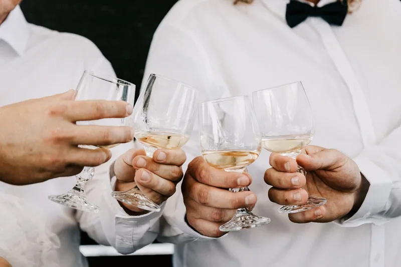 hands cheering with shots