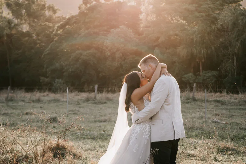 bride and groom sunset