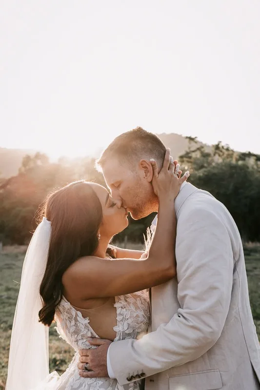bride and groom sunset