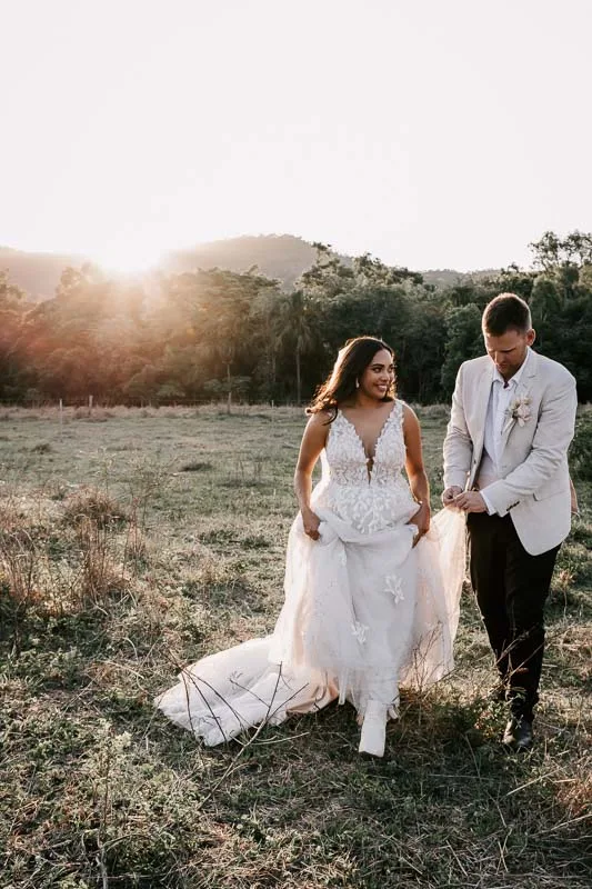 bride and groom sunset