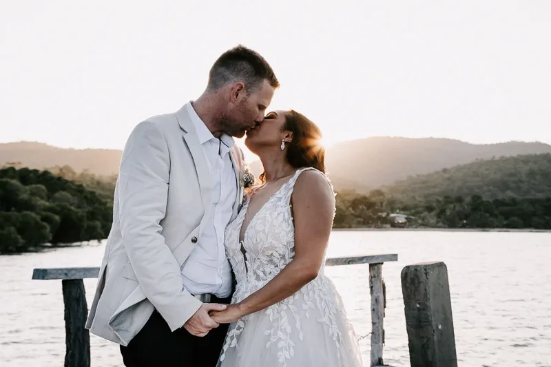 bride and groom sunset