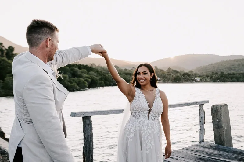 bride and groom sunset dancing on earlando jetty