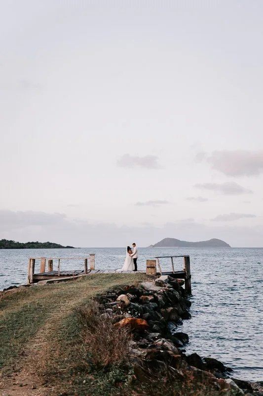 bride and groom sunset on earlando jetty