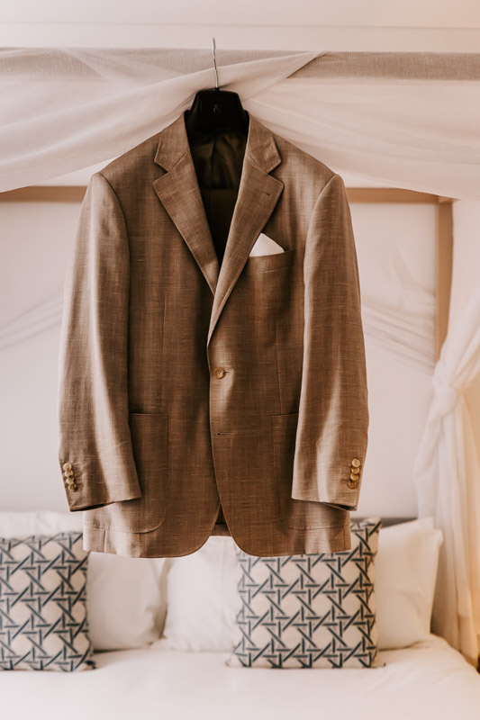 grooms suit jacket hanging