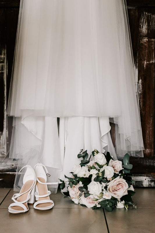 wedding dress, shoes and bouquet