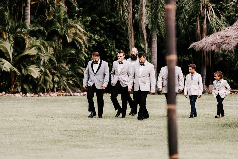 groom and groomsmen walking to ceremony