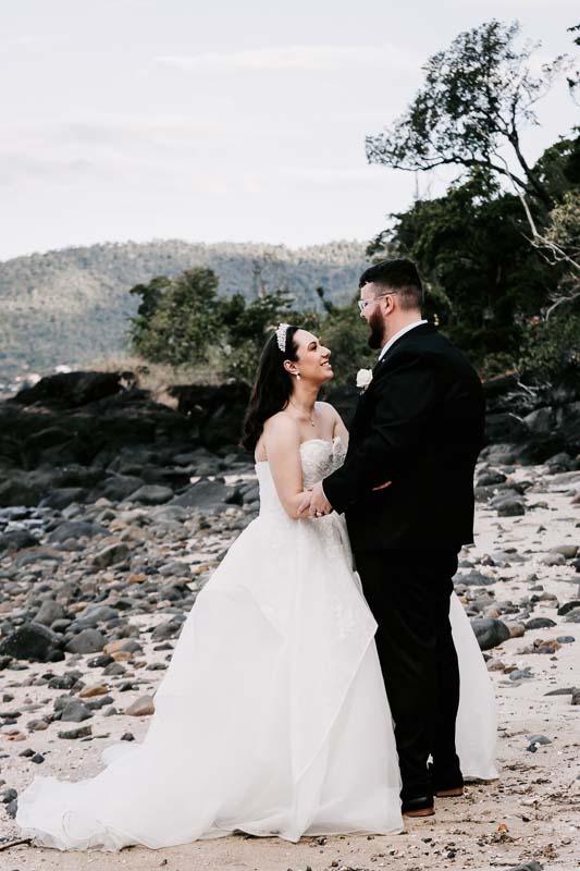 bride and groom at the rocks