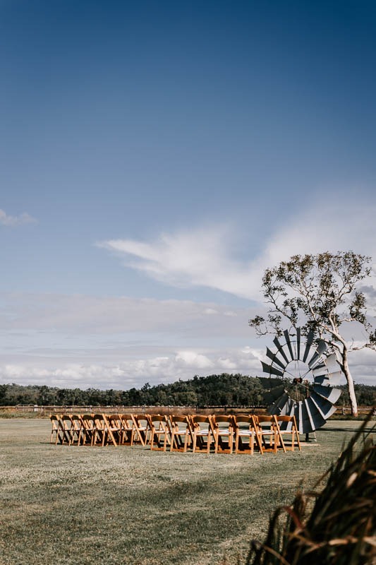 ceremony setting with large windmill blades