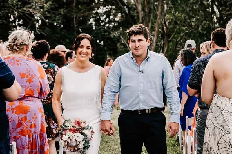 Bride & Groom walk down the isle