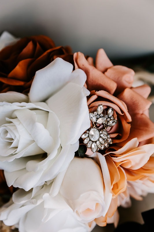 Brides earrings in bouquet