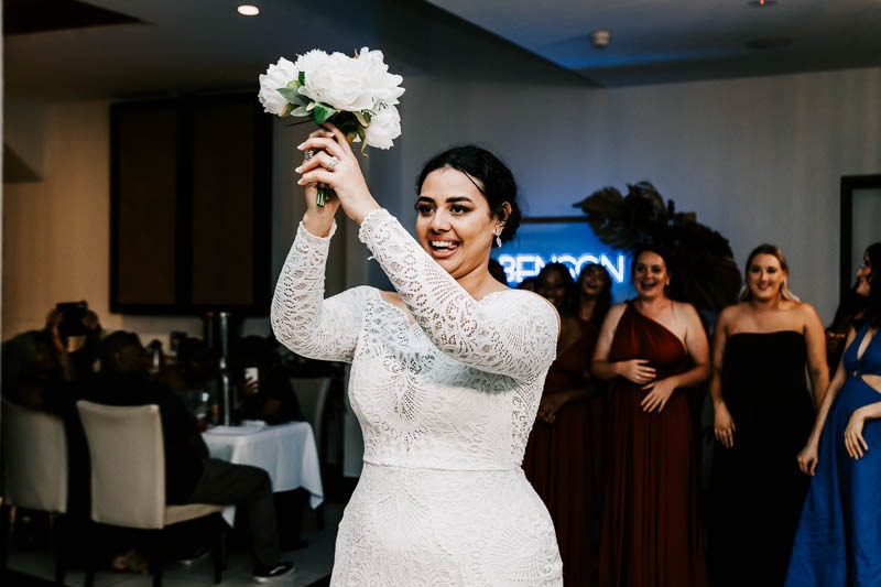 Bride throws bouquet