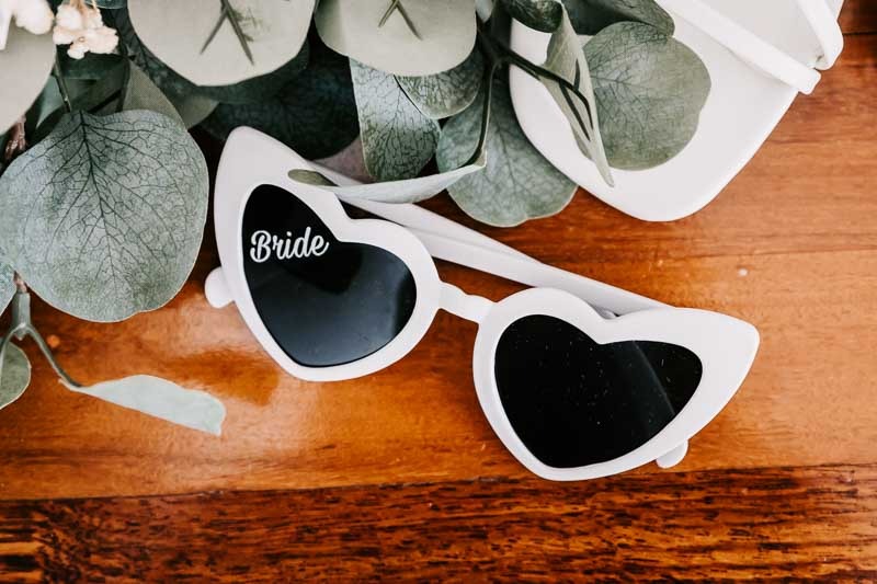 Heart shaped sunglasses with Bride written in corner