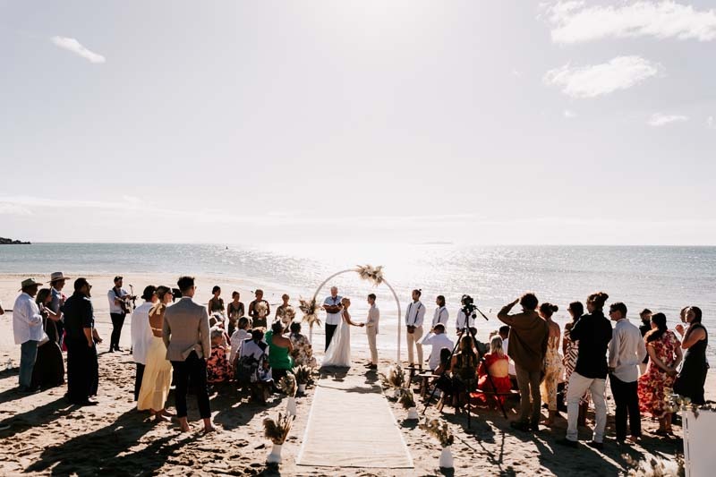 Beach ceremony with guests