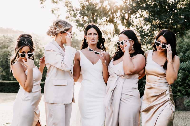 Bride and bridesmaids with sunglasses