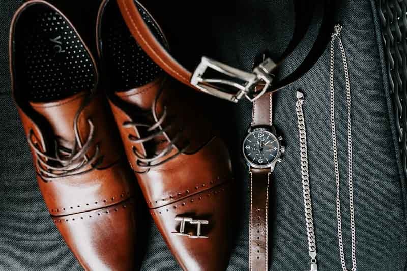 Grooms shoes, watch, belt and jewelry