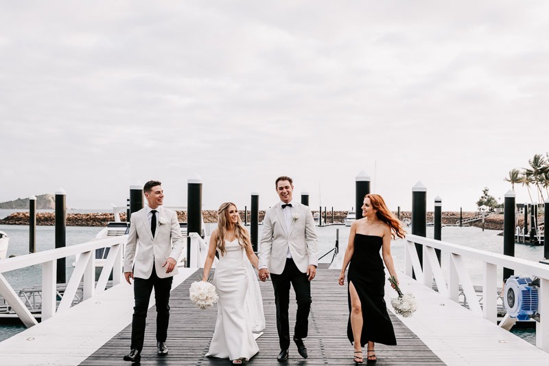 Bride & Groom with bridal party on jetty