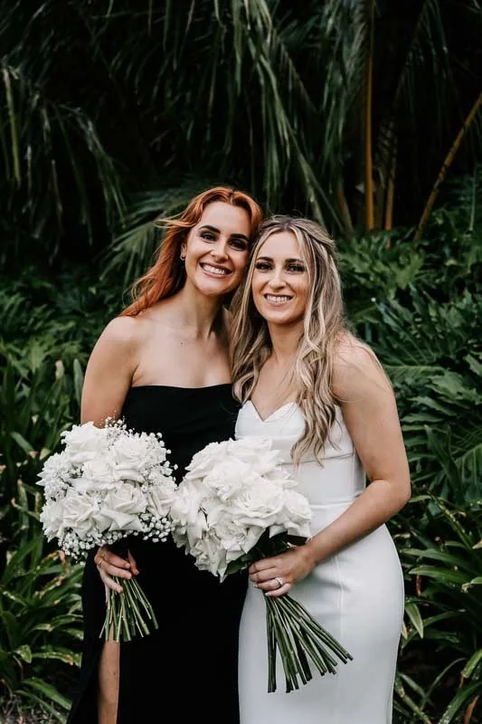 Bride & Bridesmaid smile
