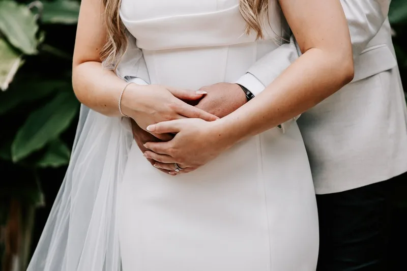 Bride & Groom embrace