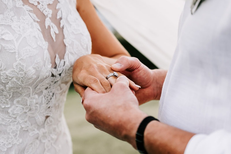 Bride shows groom ring