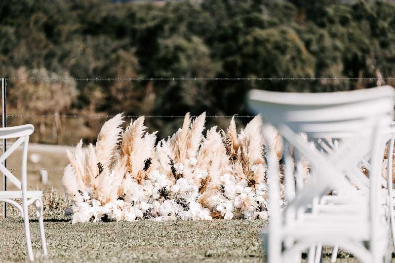 Ceremony backdrop of dried flowers