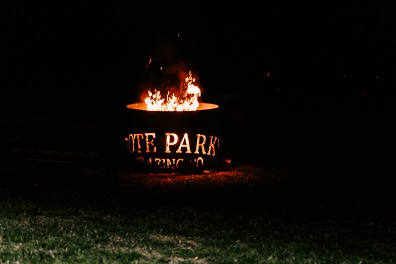 Fire pit with Note Park carved into side