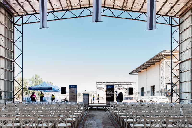 Seating set up with stage in large undercover shed