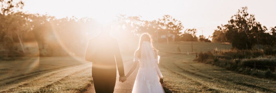 Professional videography photography drone footage of wedding couple