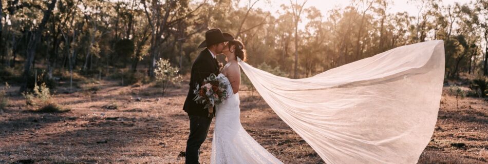 Professional videography photography and drone footage of wedding couple