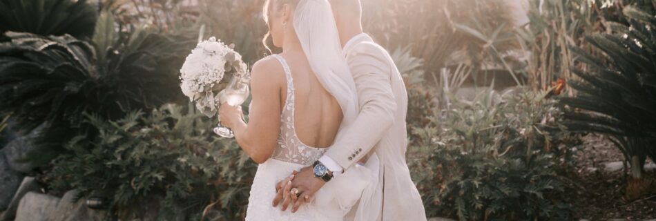 Professional videography photography drone footage of a wedding couple