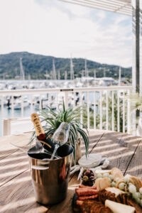 Champaign and nibble overlook the port of airlie