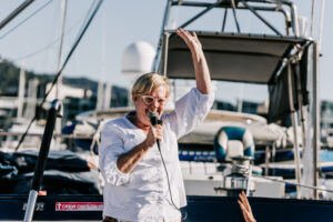 FCTA May22-Th3rd Dimension Media-LR-100 Guest speaker addressing Flight Centre team on yacht during Whitsundays corporate retreat
