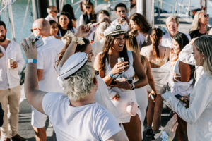 FCTA May22-Th3rd Dimension Media-LR-138 Group photo of Flight Centre team on yacht deck in Airlie Beach, Queensland