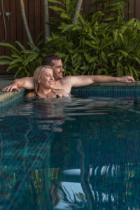 YGRO-Babymoon-TDM-LR-14 Couple smiling in private plunge pool at Yangaro luxury retreat