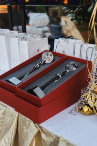 18-11-23 Fashion - Full Gallery TDM LR-33 Professional videography trophy awards in red gift boxes displayed