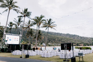 Professional videography, photography, and drone footage at outdoor tropical event setup