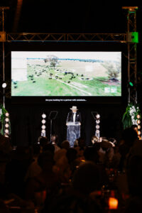 Professional videography at an event with screen presentation