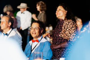 Professional videography, photography at an evening event celebration