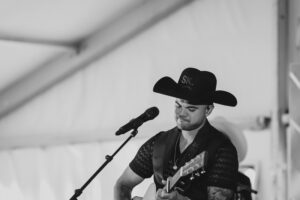 Full Gallery NMD 24 LR-367 Professional videography capturing live music performance in black and white