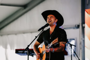 Full Gallery NMD 24 LR-379 Professional videography musician performing live on stage