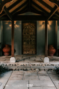 Jungle Echo – Low Res Export-10 Professional videography showcasing elegant wooden door entrance