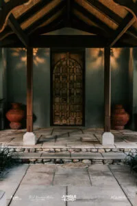 Professional videography showcasing elegant wooden door entrance