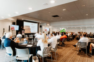 Professional videography conference with audience and presentation